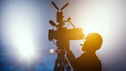 Spotlights and cameraman