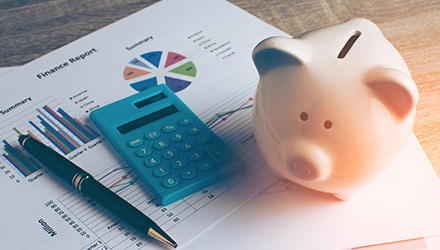 Piggy bank and calculator