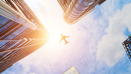 High-rise buildings with airplane