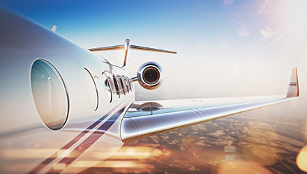 Side of airplane in the sky