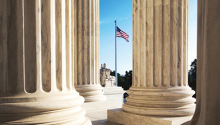 Courthouse columns and American flag