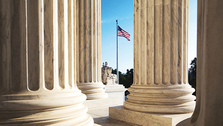 Courthouse columns and American flag