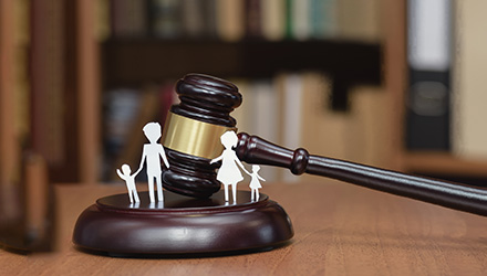 Gavel with paper family cut-outs