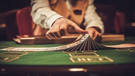 Dealer Shuffling Cards