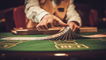 Dealer Shuffling Cards