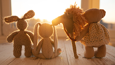 Stuffed animals by window