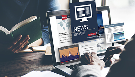 News website on laptop