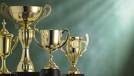 four gold trophies