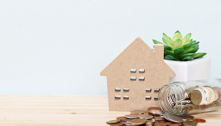 cardboard 2d home, coin jar and succulent