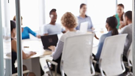 Employees Talking Inside of a Conference Room