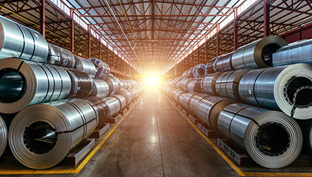 Rolls of sheet metal in a warehouse