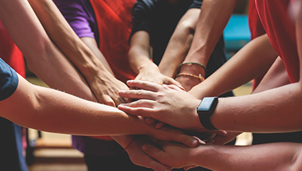 Team with hands-in