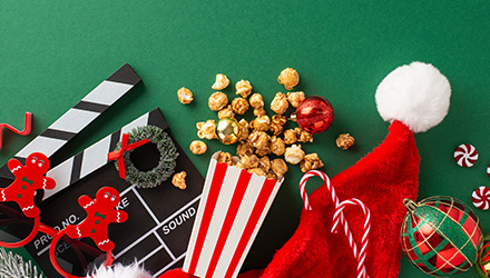 Image of a Christmas Hat, Movie Reel and Popcorn