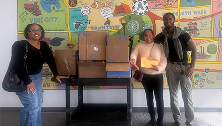 Fox team with donations for Boyce L. Ansley School
